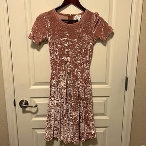 Holiday dresses. Cap sleeve, midi length with pockets.